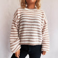 Women's loose vintage stripe knit pullover sweater in a choice of four colours on a hanger.