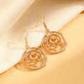 Gold spiral donut jewellery set showing necklace, bracelet and earrings with geometric circle design