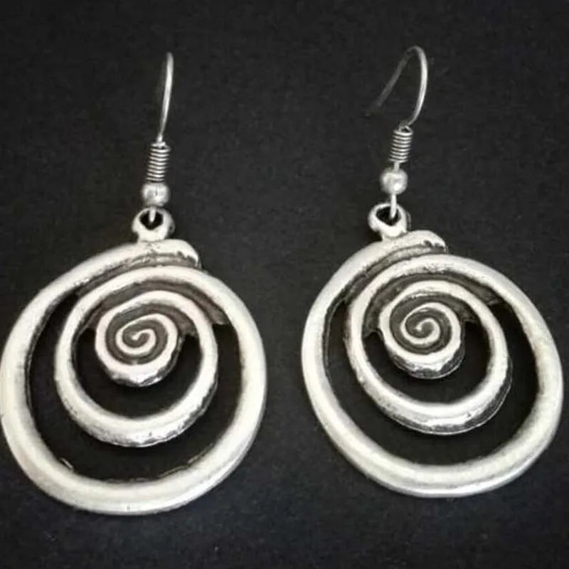 Silver geometric spiral distressed earrings with vintage ethnic style design