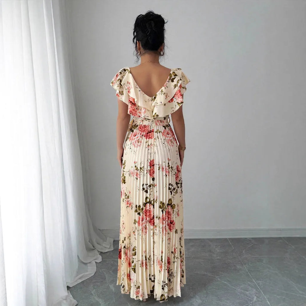 Apricot floral print V-neck dress with ruffled sleeves and a full swing skirt.