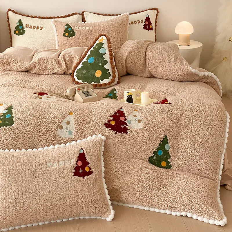 Bright yellow fleece-lined Christmas tree cartoon pattern quilt cover and pillowcases from a four-piece bedding set.