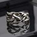 Adjustable copper men's ring with thorn flower design in geometric shape