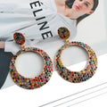 Cartoon style alloy earrings with large round colour pendants