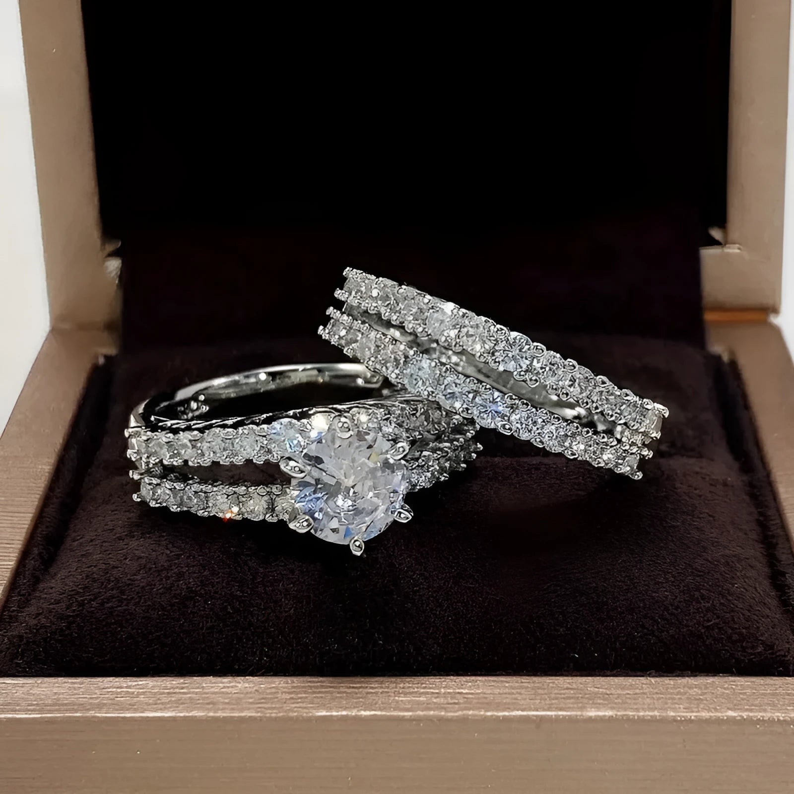 Women's 2-in-1 ring set showing both geometric fashion ring and fully-jewelled ring in gold colour