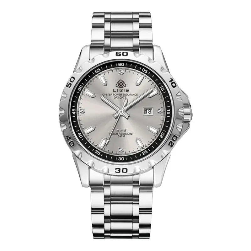 Men's silver quartz watch with luminous hands and stainless steel strap on wrist