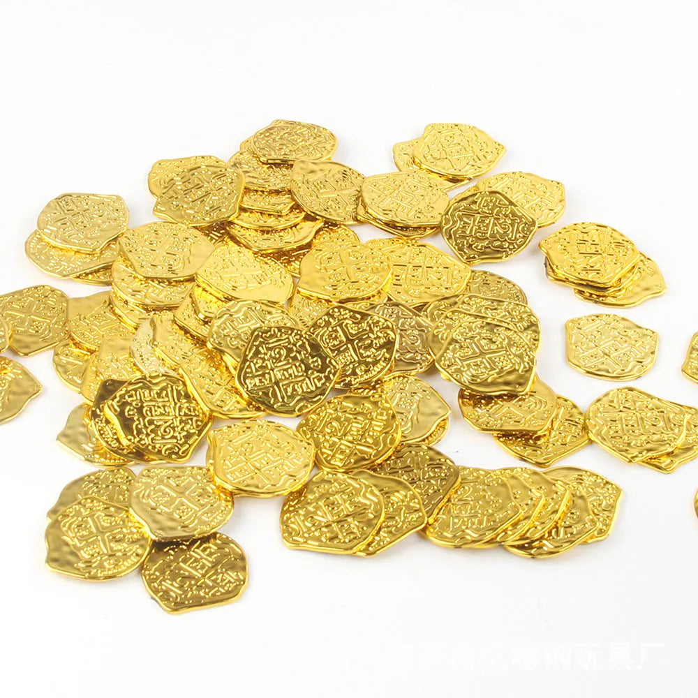 Set of 100 plastic Roman coins with electroplated bronze, gold, or silver finish, shown in hand for scale.