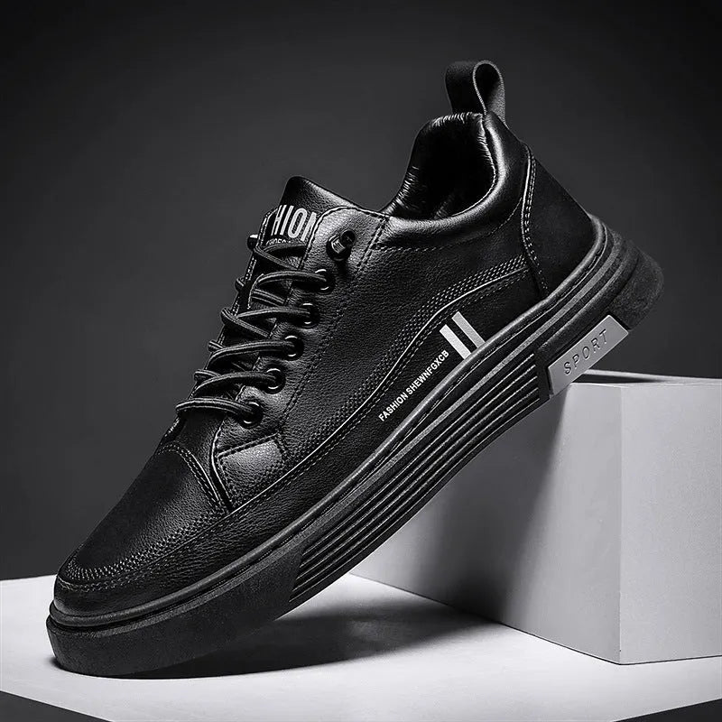 Men's low-top white skate shoes with elastic band fastening and a round toe, shown on a plain background.