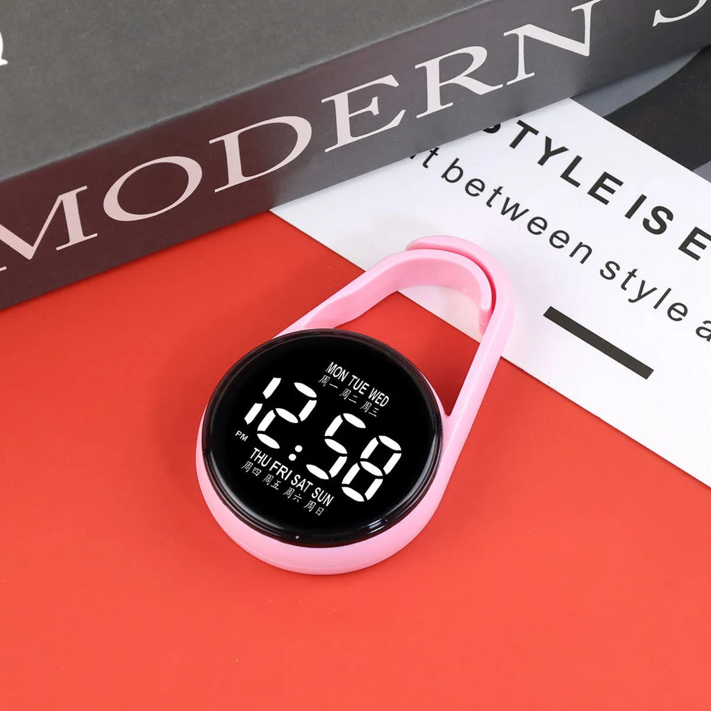 Mini electronic watch with luminous LED display and plastic strap in various colour options