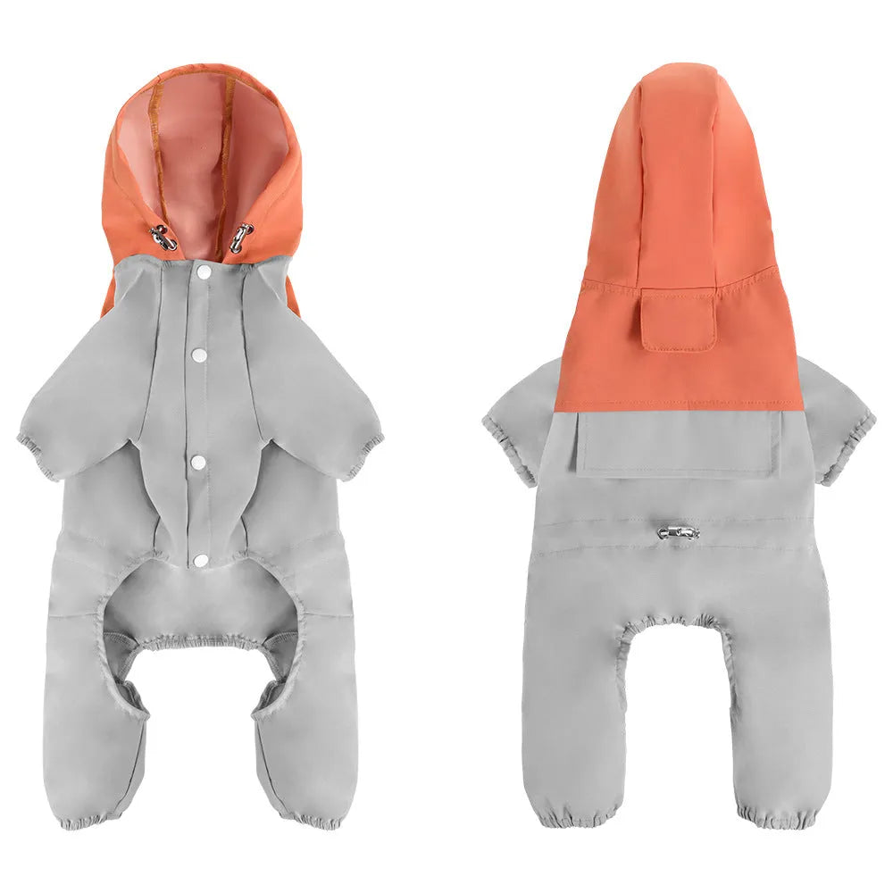 A khaki coloured British style waterproof shell jacket on a small to medium sized dog.