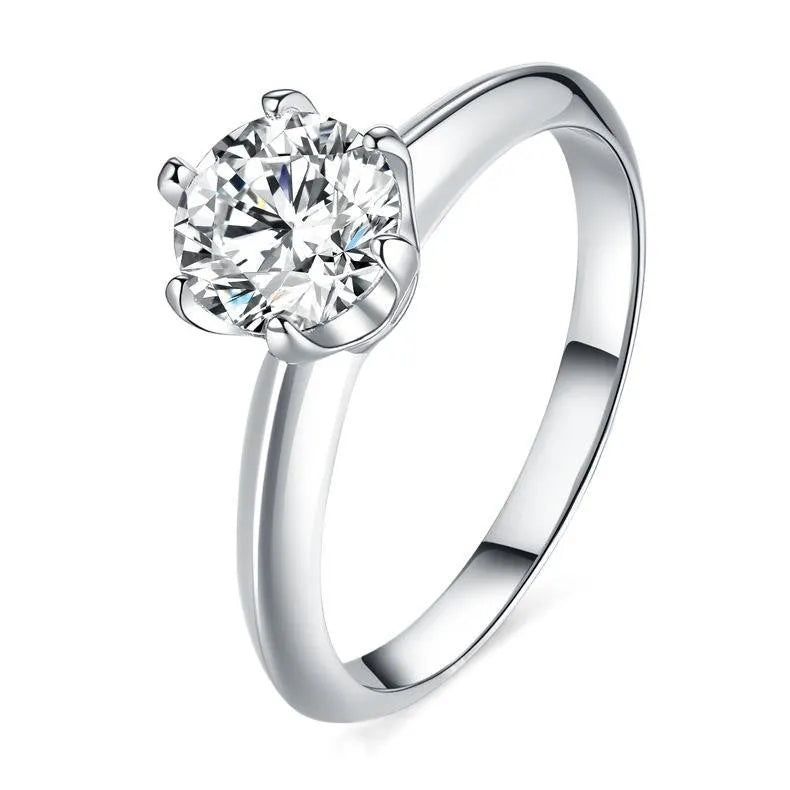 Silver heart-shaped couple rings with dragon phoenix design and adjustable opening showing moissanite stones