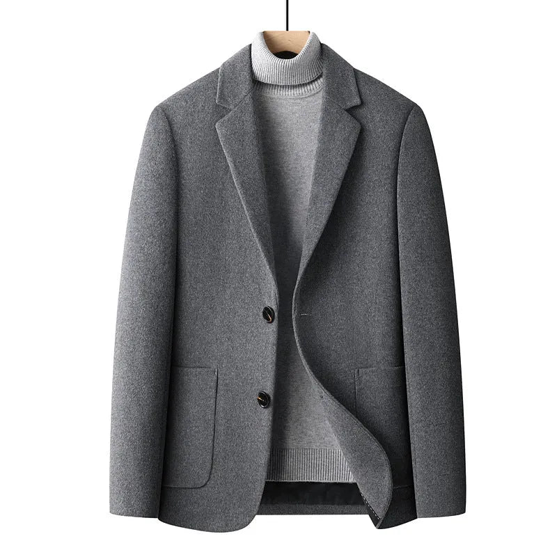 Men's slim fit wool suit jacket in grey on a hanger