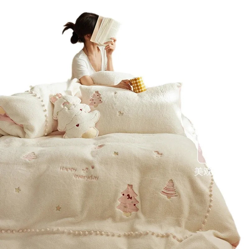 Winter milk fibre bedding four-piece set with green Christmas tree reactive print on a quilt cover and pillowcase.