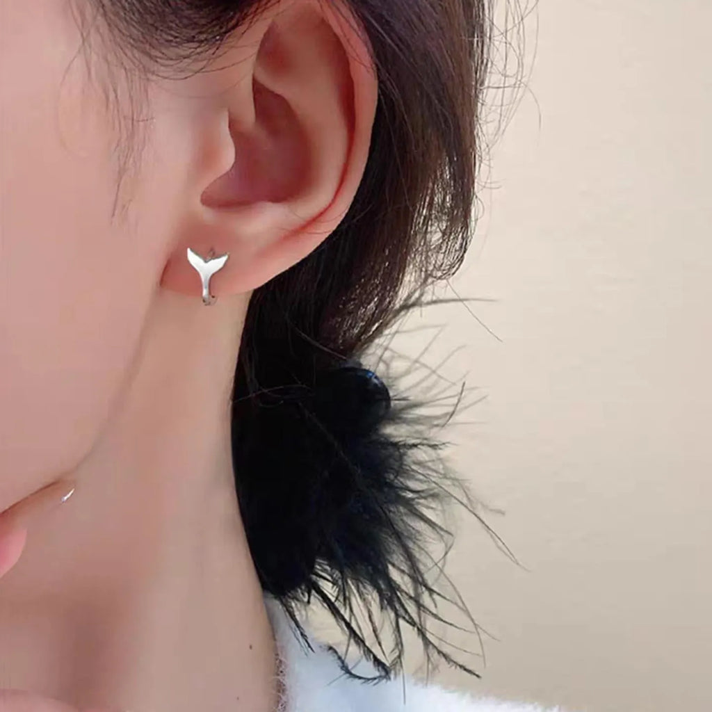 Women's fishtail design copper earrings with electroplated finish in white gold or yellow gold colour