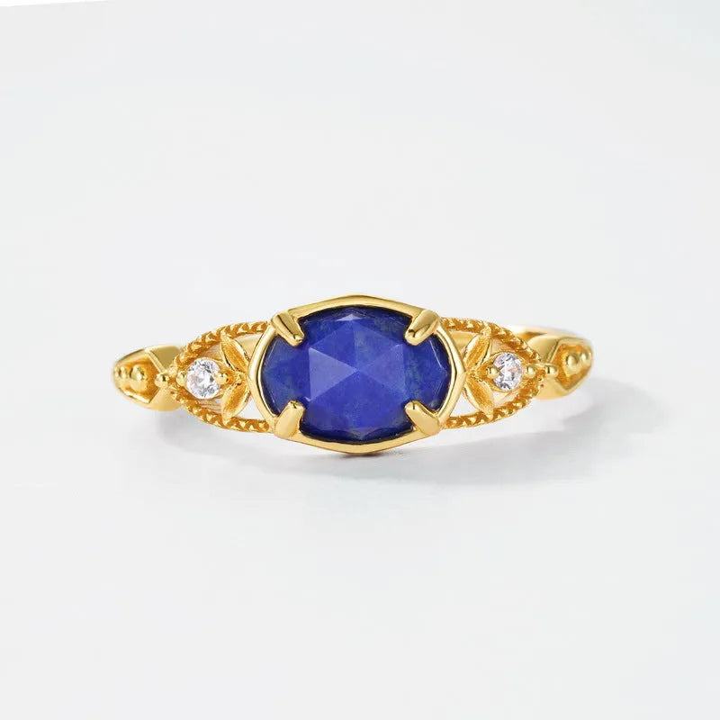 Geometric silver ring with elliptical lapis lazuli stone in Japanese style design