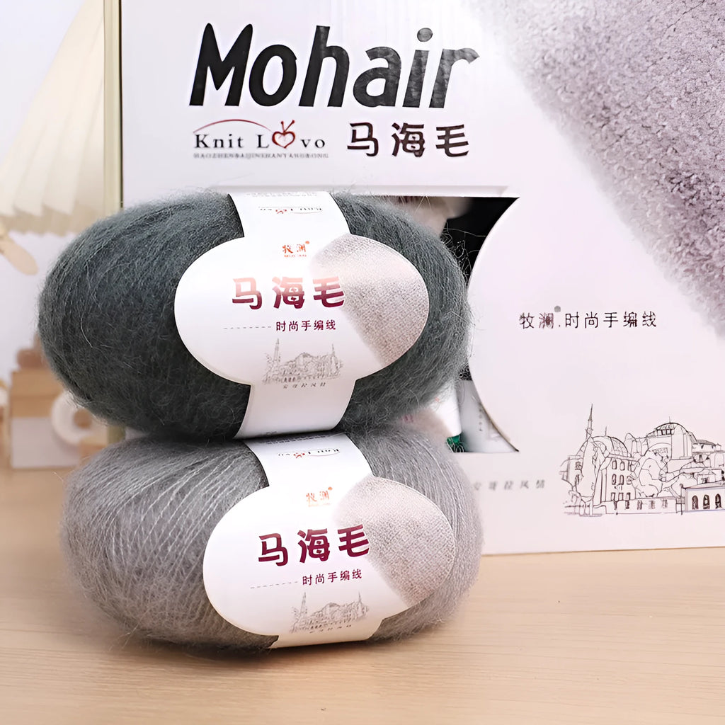 Ball of mohair wool for DIY scarf knitting kit in one of 34 colours including blue, pink, green, grey, and black.