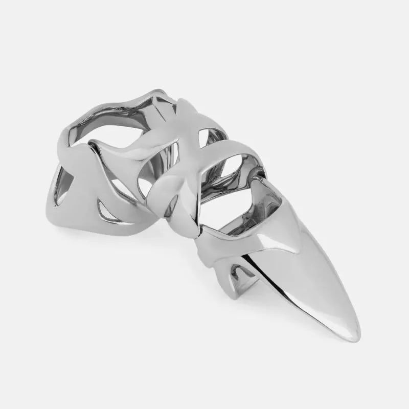Silver alloy punk armour finger stall fashion ring on a black background.