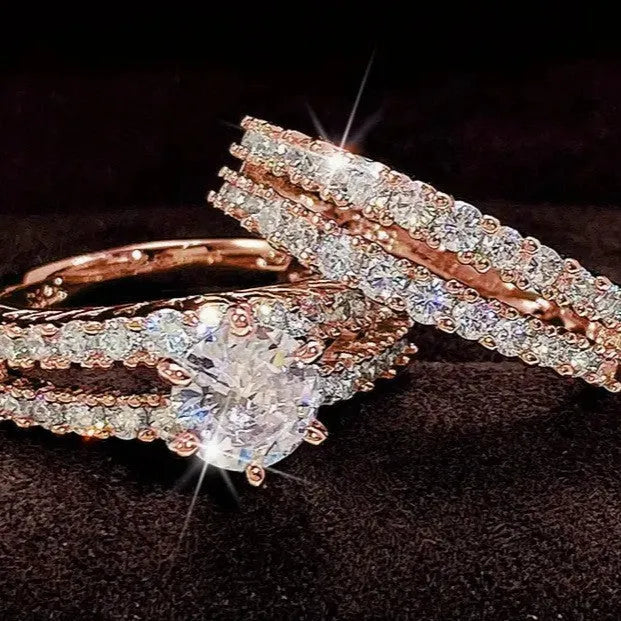 Women's 2-in-1 ring set showing both geometric fashion ring and fully-jewelled ring in gold colour