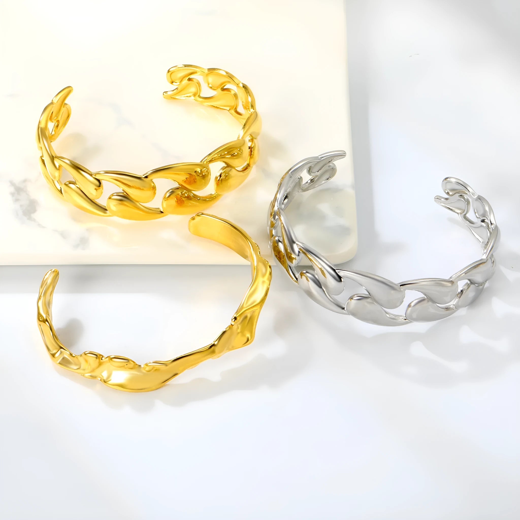 Stainless steel alloy European American design bracelet in gold, rose gold, and silver tones