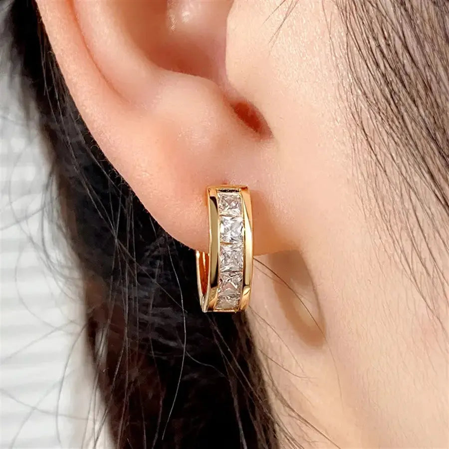Geometric quadrilateral copper drop earrings for women in gold tone and silver tone options.