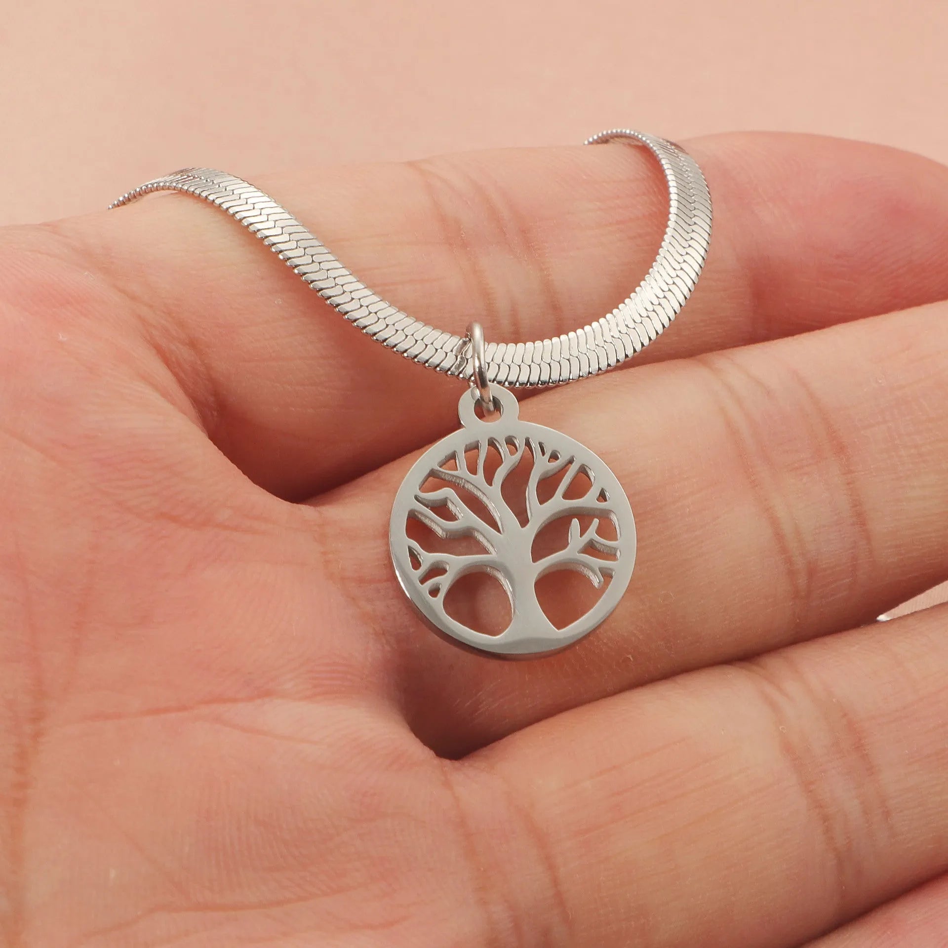 Stainless steel clavicle chain with tree pendant on snake bone chain in gold or steel colour.
