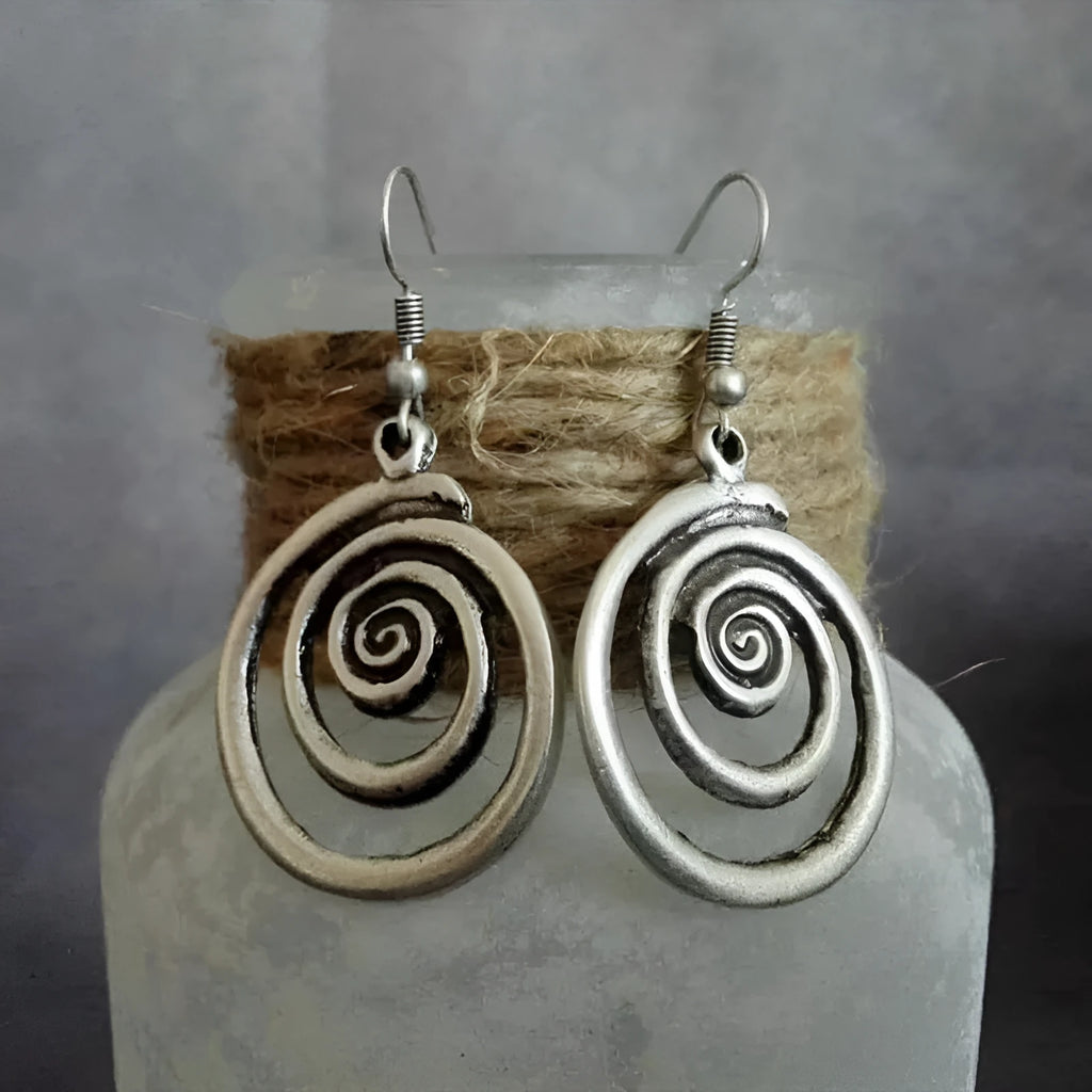 Silver geometric spiral distressed earrings with vintage ethnic style design