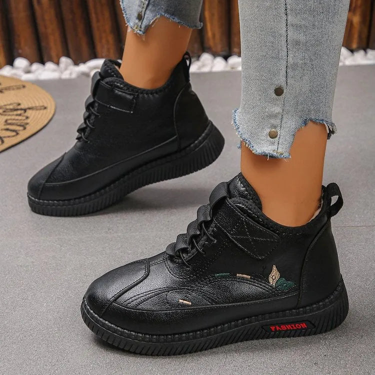 Women's black velvet slippers with cotton lining and rubber sole, low-cut design with hollow-out details
