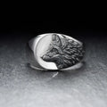 Men's silver geometric wolf head ring in retro style, showing angular alloy construction.