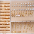 108 geometric alloy earrings with round pearl elements in gold and yellow electroplated finishes for women