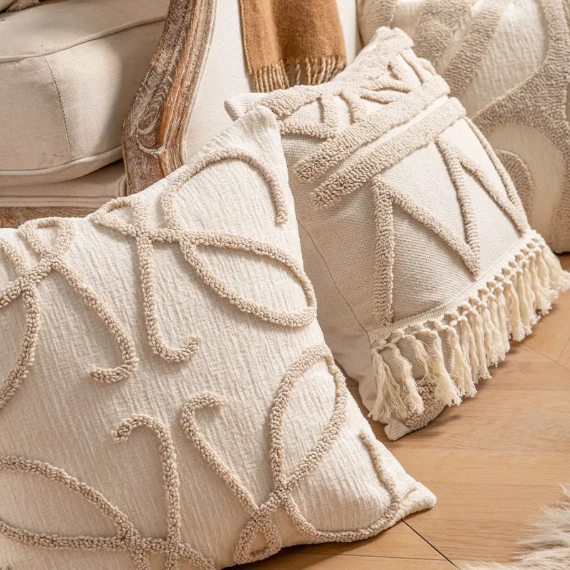 Printed sofa cushion cover with knitted tassel trim in a choice of six patterns and two sizes.