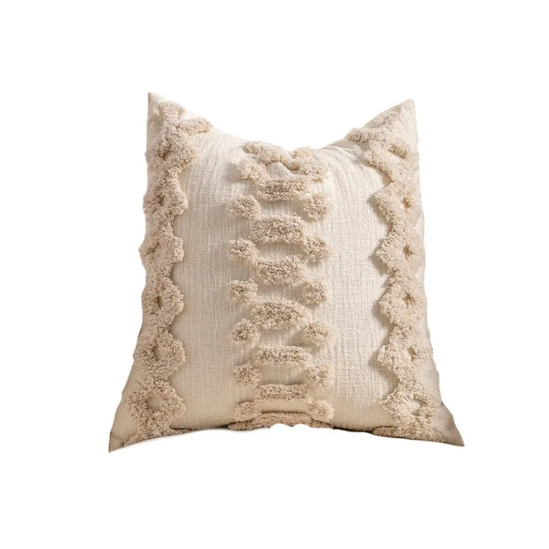Printed sofa cushion cover with knitted tassel trim in a choice of six patterns and two sizes.