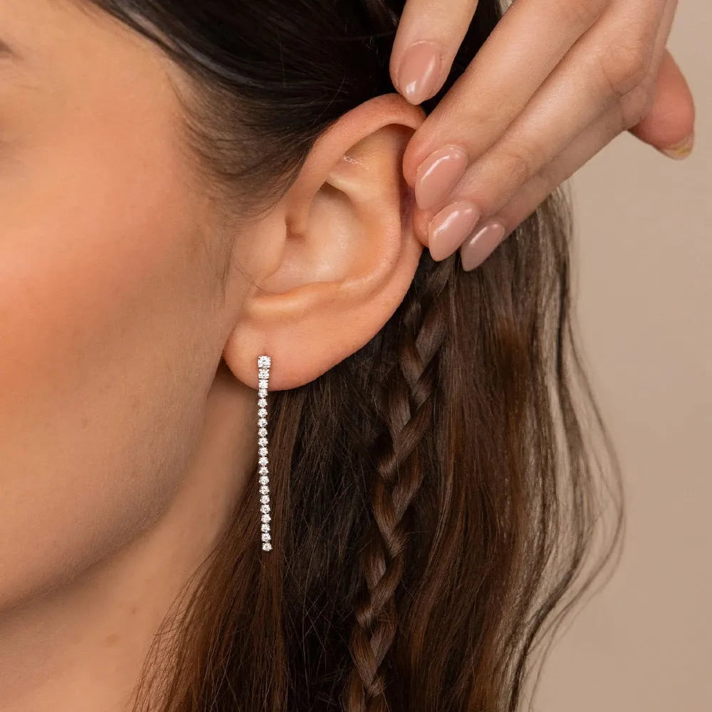Geometric stainless steel earrings with linear Chinese-style design in gold and steel colours