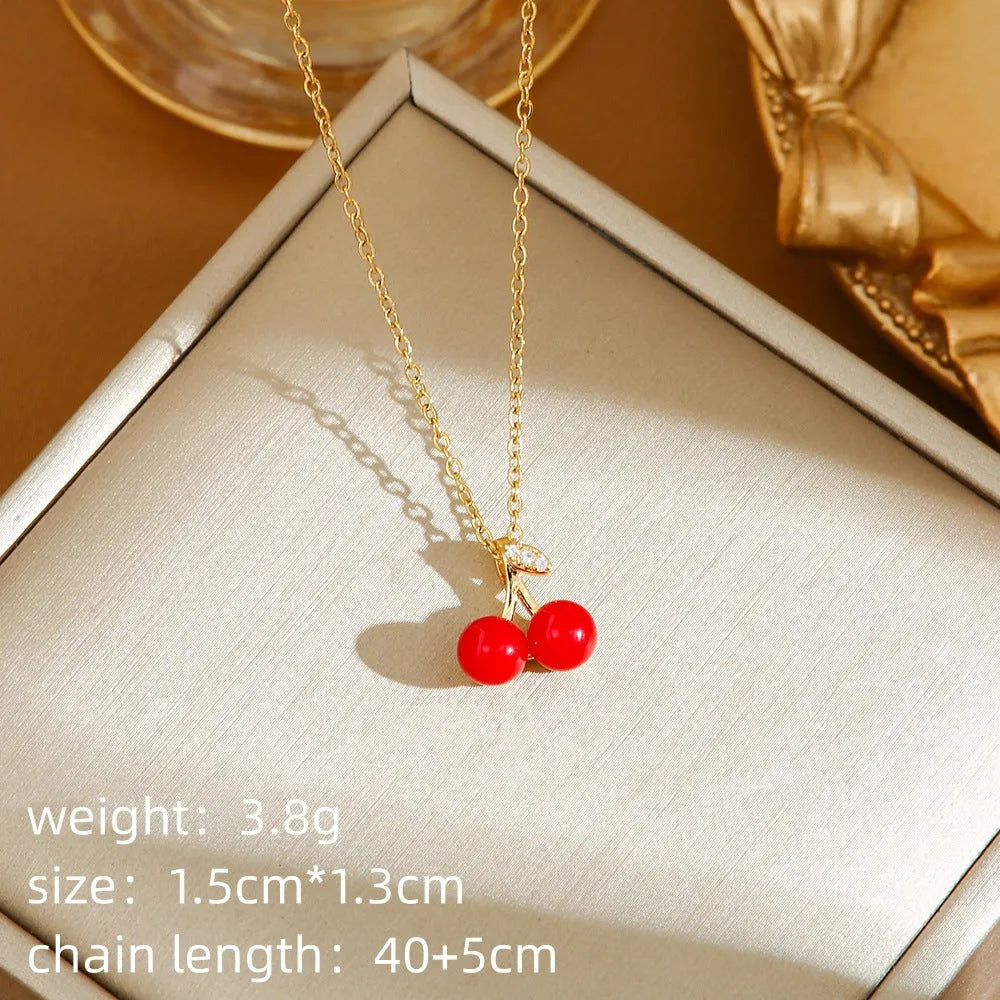Titanium steel fashion necklace with delicate fruit and pepper pendant designs on O-ring chain