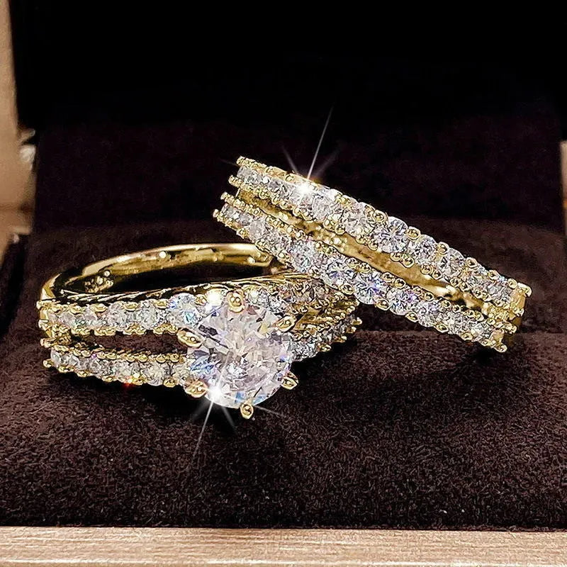 Women's 2-in-1 ring set showing both geometric fashion ring and fully-jewelled ring in gold colour