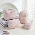Flannelette makeup bag four-piece set in cube style, shown in blue with dots colour.