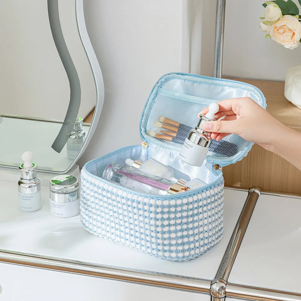 Flannelette makeup bag four-piece set in cube style, shown in blue with dots colour.