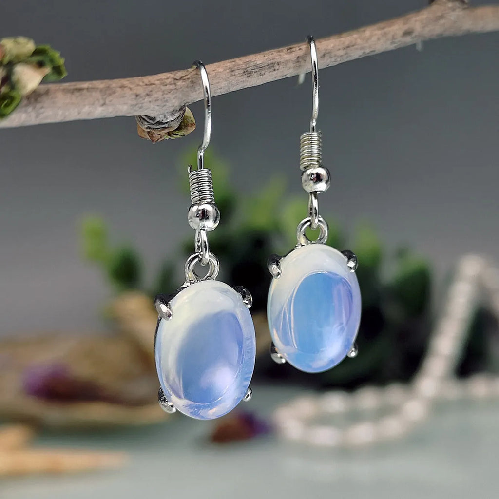 Moonlight white opal earrings with retro drop shape design and ellipse elements