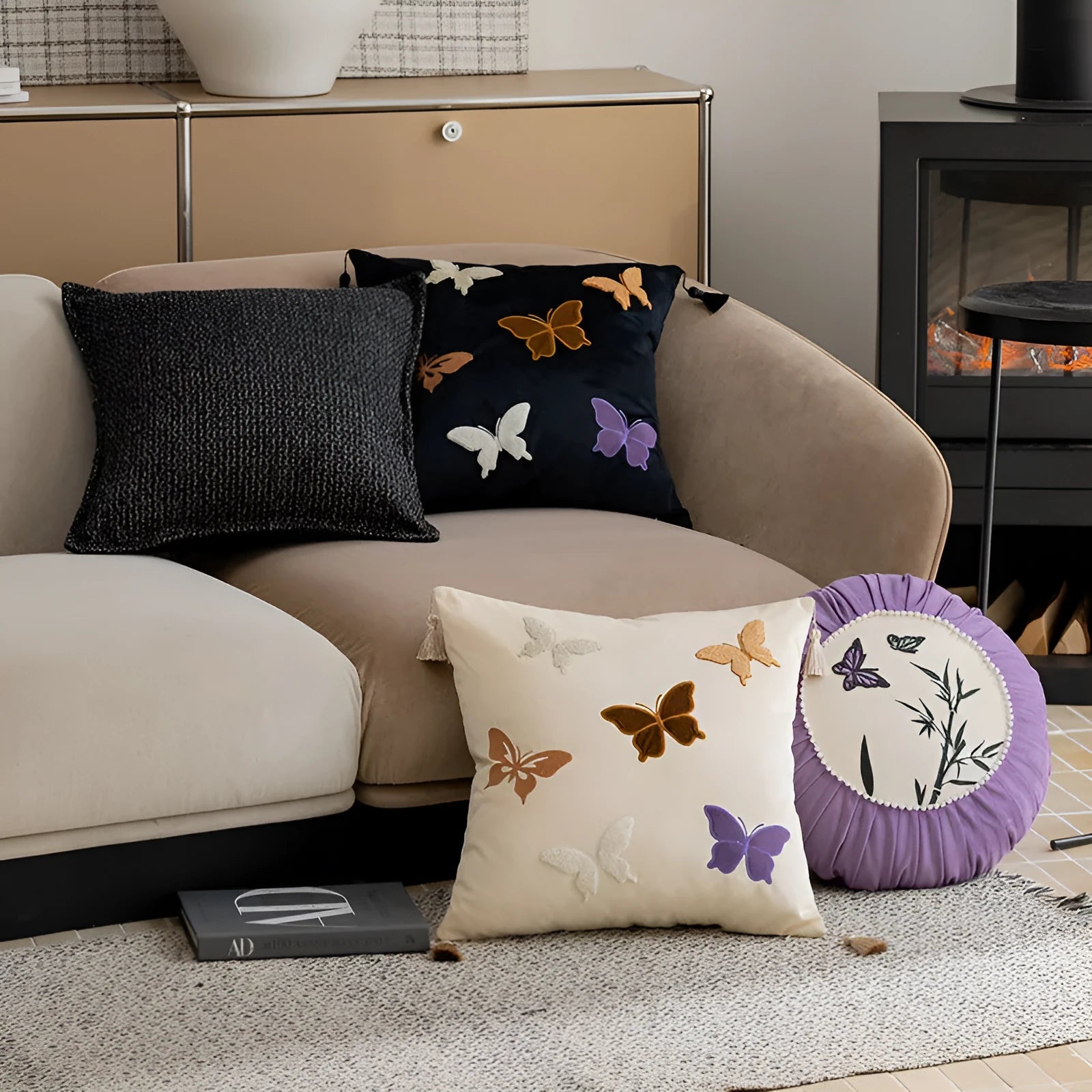 Square beige cushion with detailed black and purple butterfly embroidery in a Chinese style.