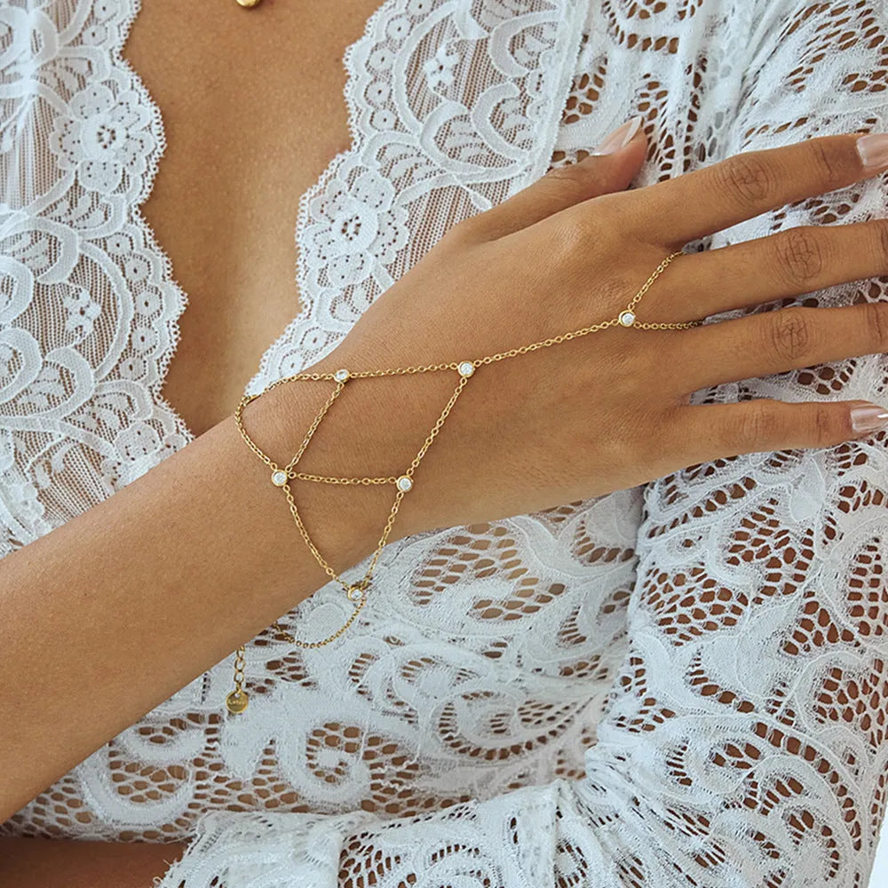 Zircon mitten-type bracelet with tassel, light luxury, stainless steel, round geometry for women.