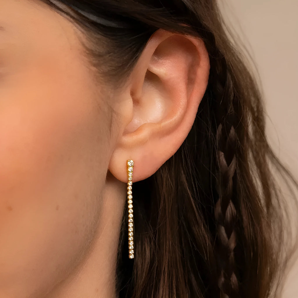 Geometric stainless steel earrings with linear Chinese-style design in gold and steel colours