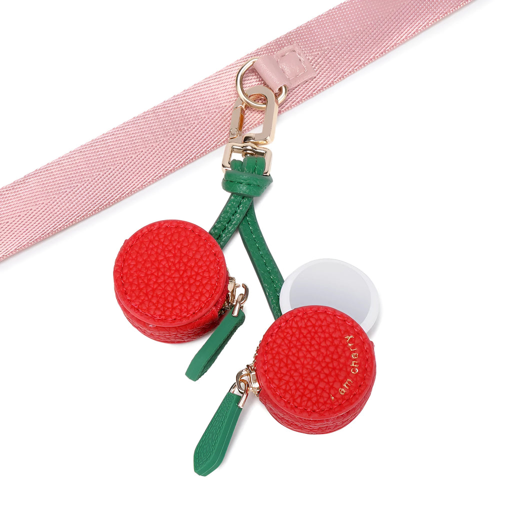 Mini leather coin purse keychain in cherry red colour with zippered closure and keychain attachment