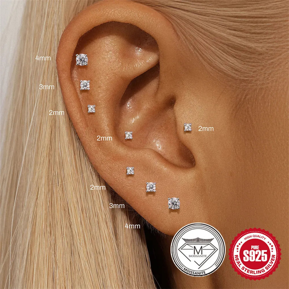 Platinum-plated S925 sterling silver stud earrings showing geometric, petal, and plain stud designs.