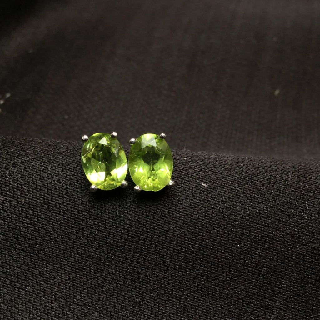 Grass green natural olivine faceted stud earrings with S925 silver posts.