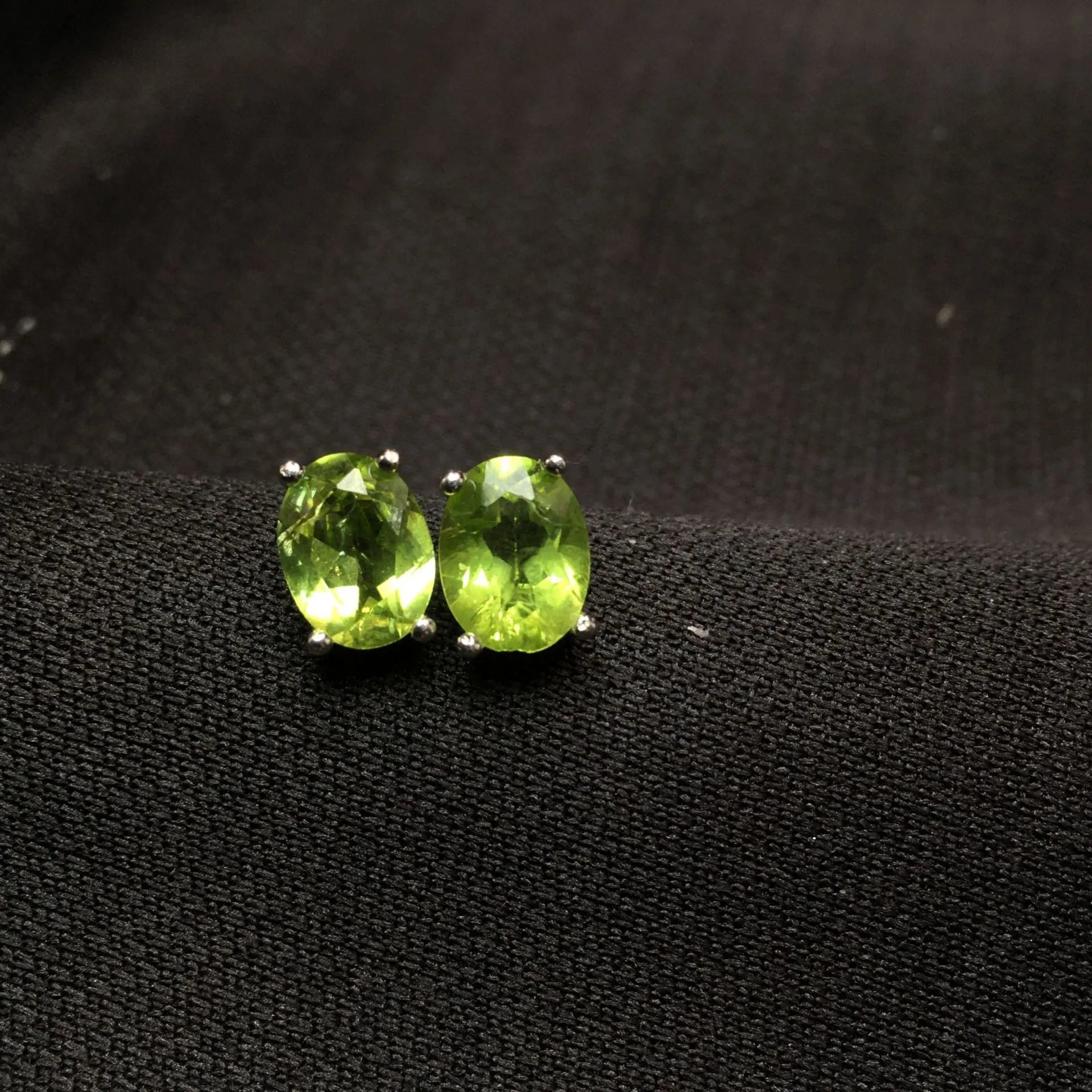 Grass green natural olivine faceted stud earrings with S925 silver posts.