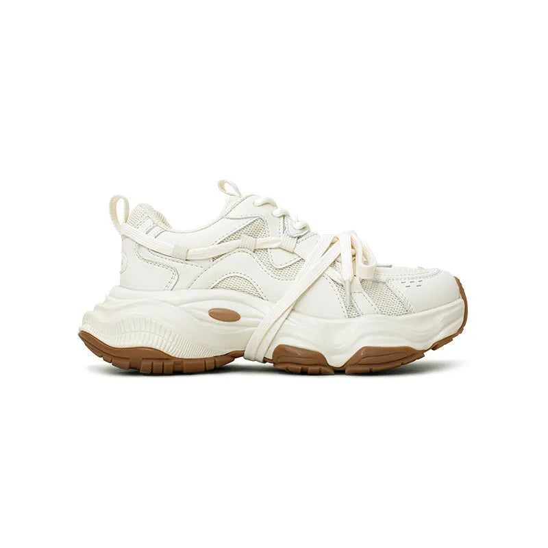 Milky white women's platform heel dad sneakers with round toe and front laces on a solid background.