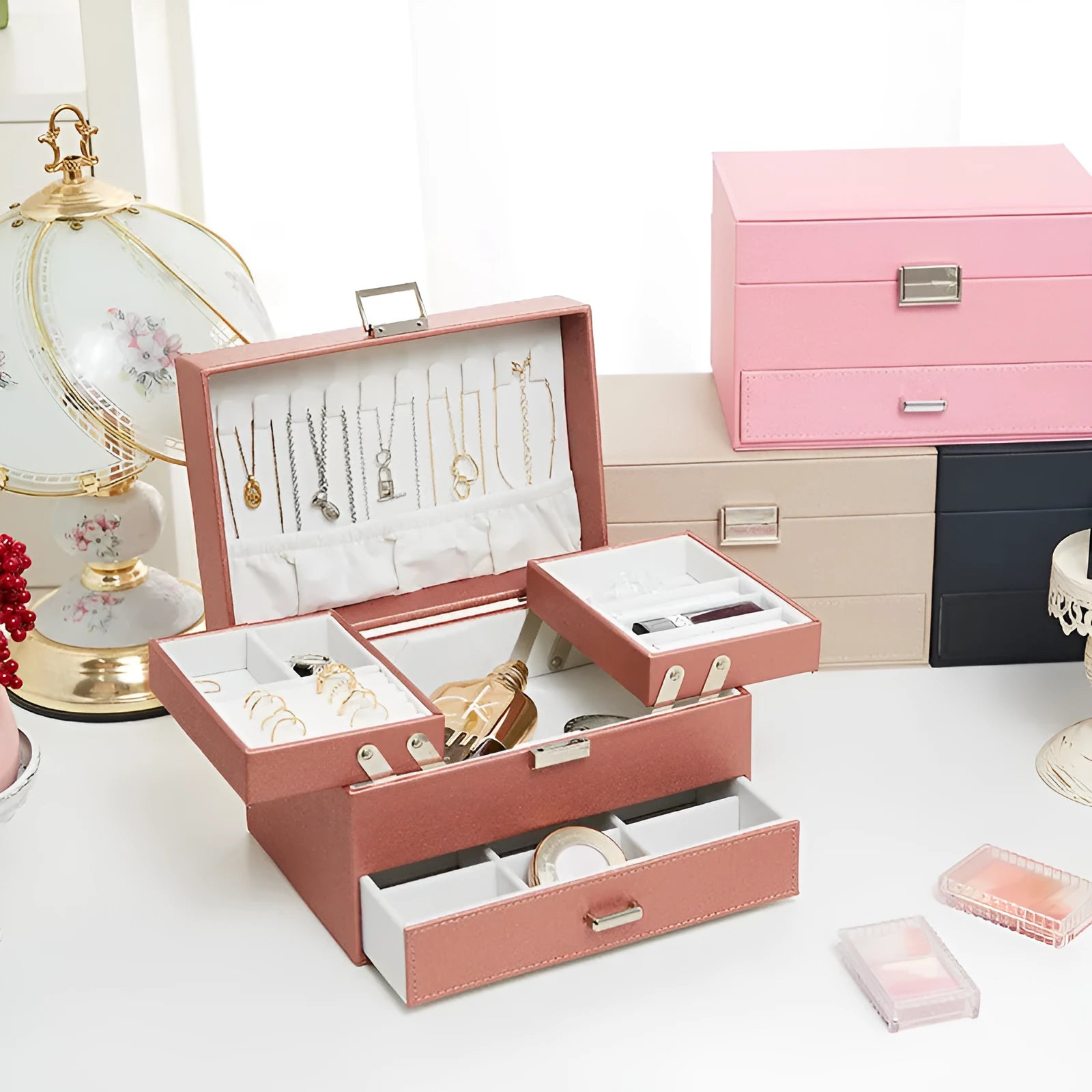 Hard leather jewellery storage box in beige with organiser compartments for rings and necklaces.