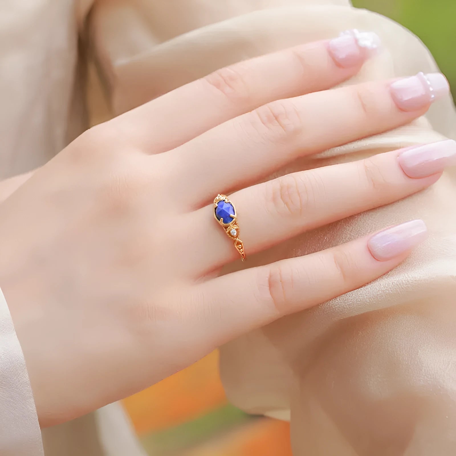 Geometric silver ring with elliptical lapis lazuli stone in Japanese style design