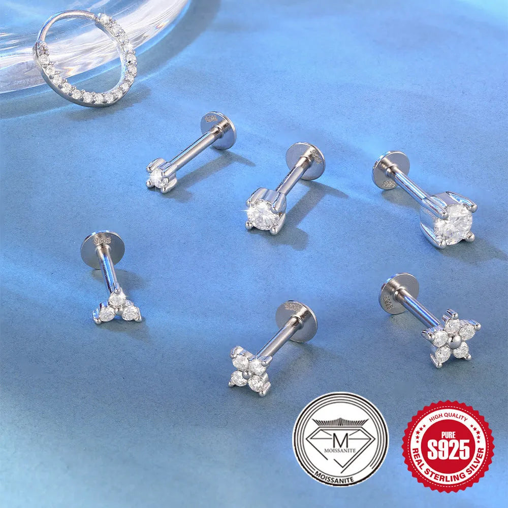 Platinum-plated S925 sterling silver stud earrings showing geometric, petal, and plain stud designs.