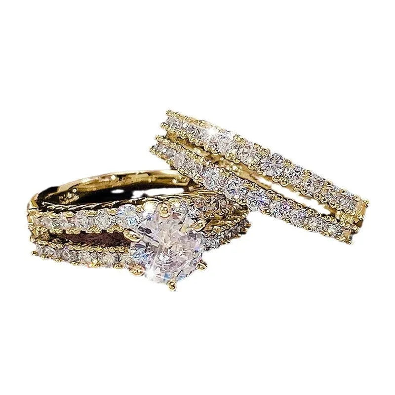 Women's 2-in-1 ring set showing both geometric fashion ring and fully-jewelled ring in gold colour
