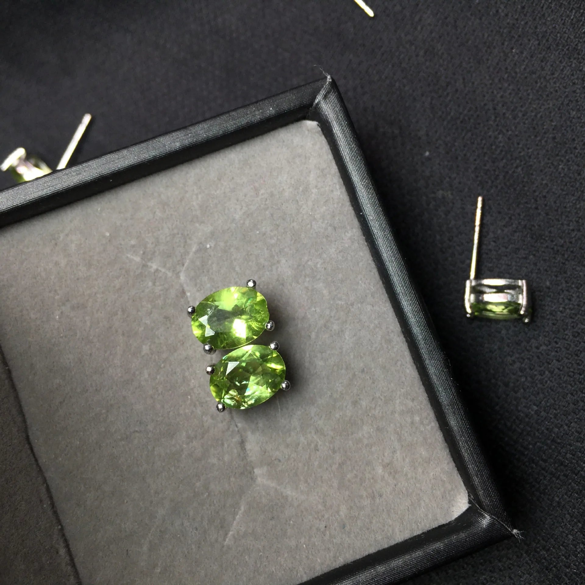 Grass green natural olivine faceted stud earrings with S925 silver posts.