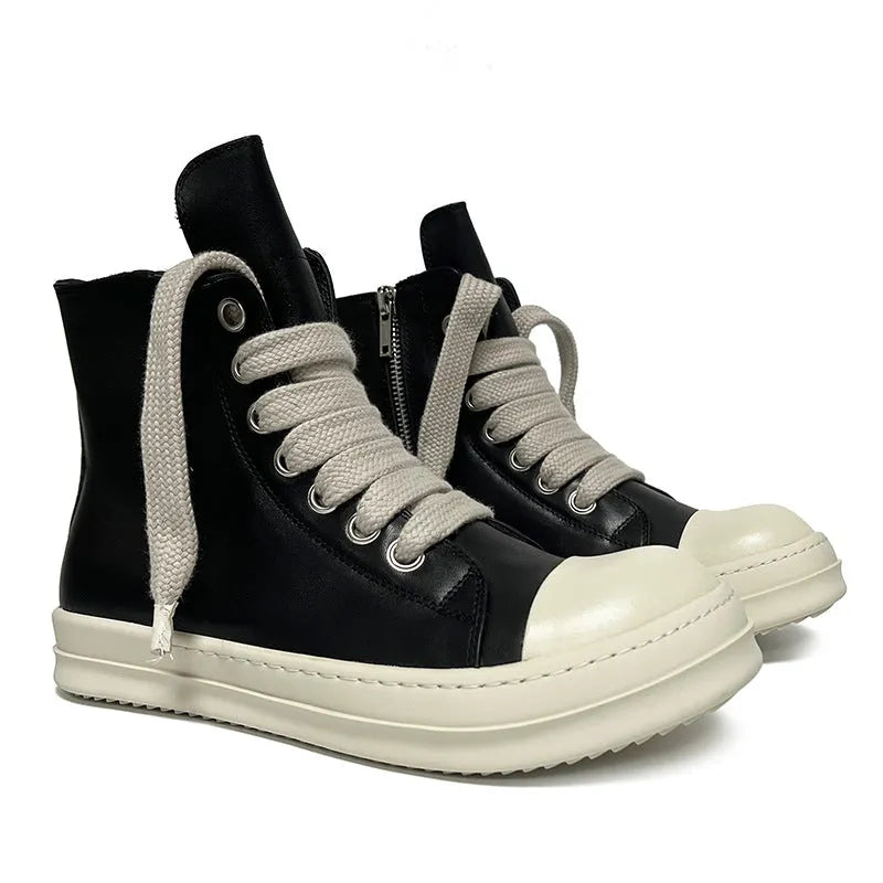 Black high-top leather sneakers with side zipper on a white background